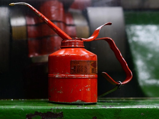 What is the function of water resistance in lubricating grease?